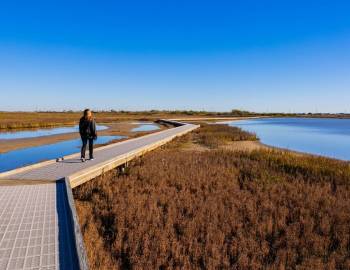 A woman at the Port Aransas Nature Preserve in Port Aransas, TX